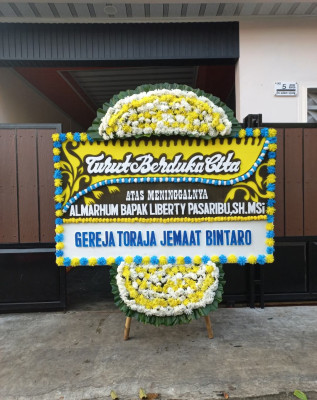 Papan Bunga Duka di 26 Ilir